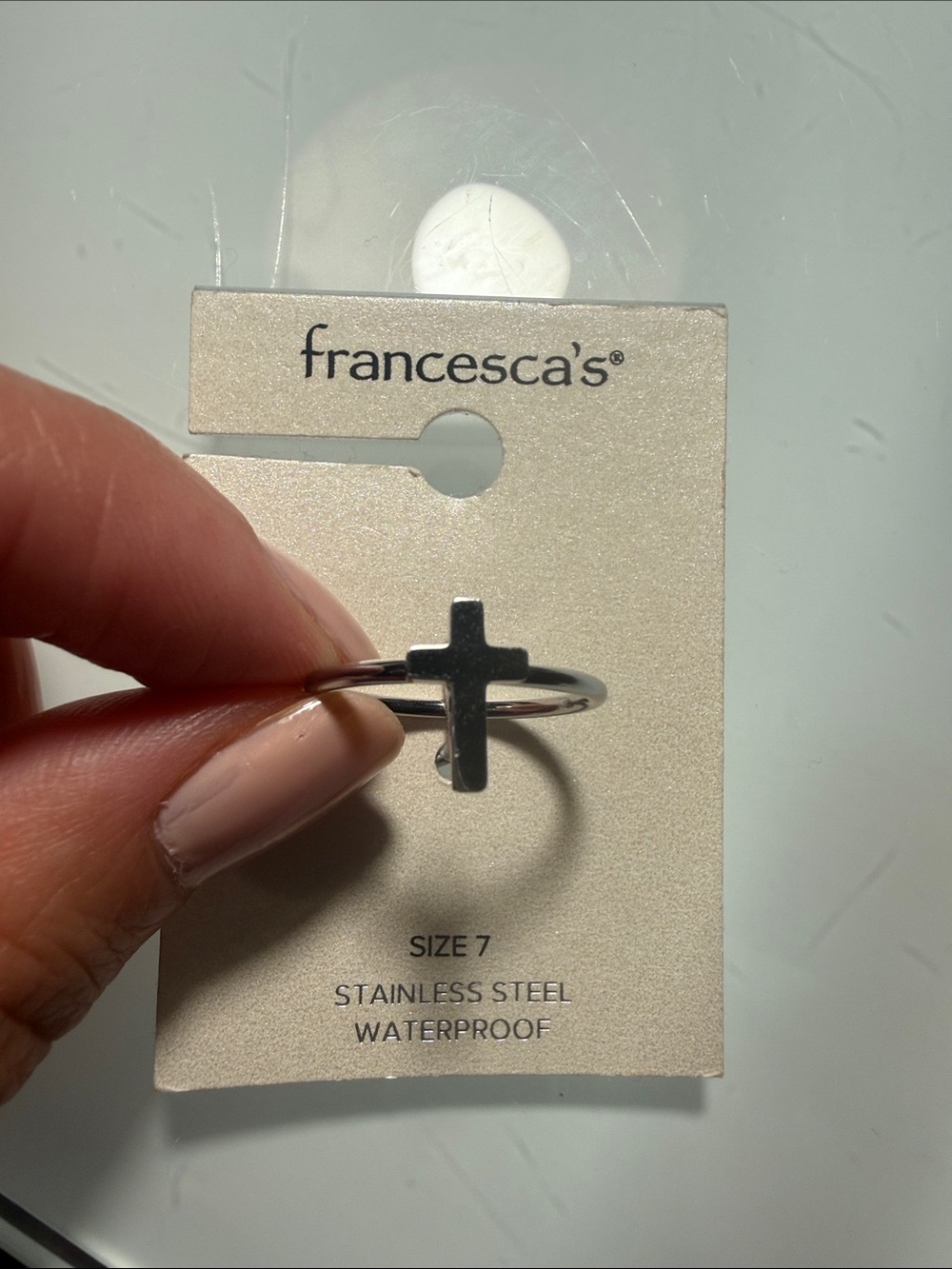 Francesca's Stainless steel waterproof cross ring